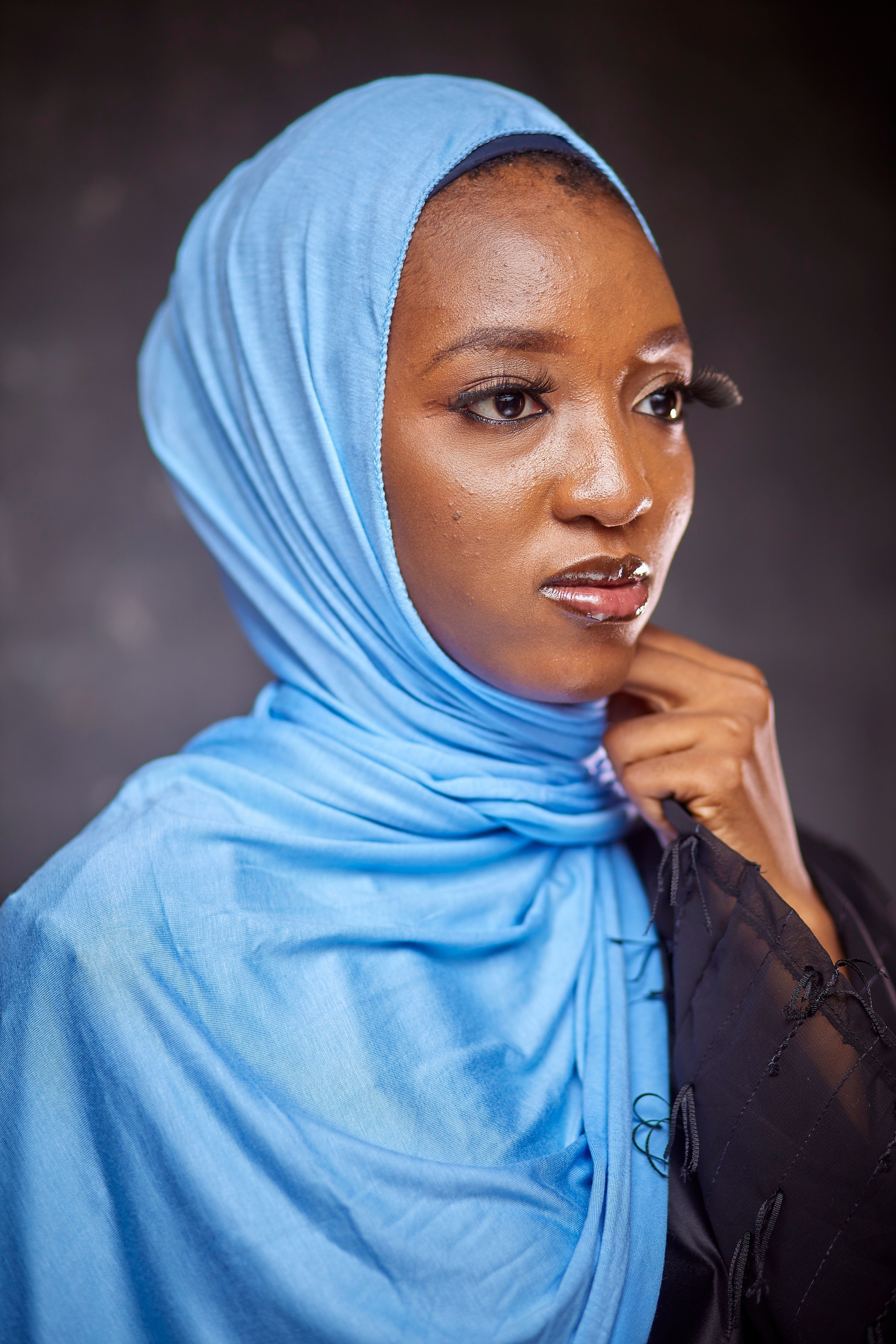 Elegant Portrait of Woman in Blue Hijab · Free Stock Photo
