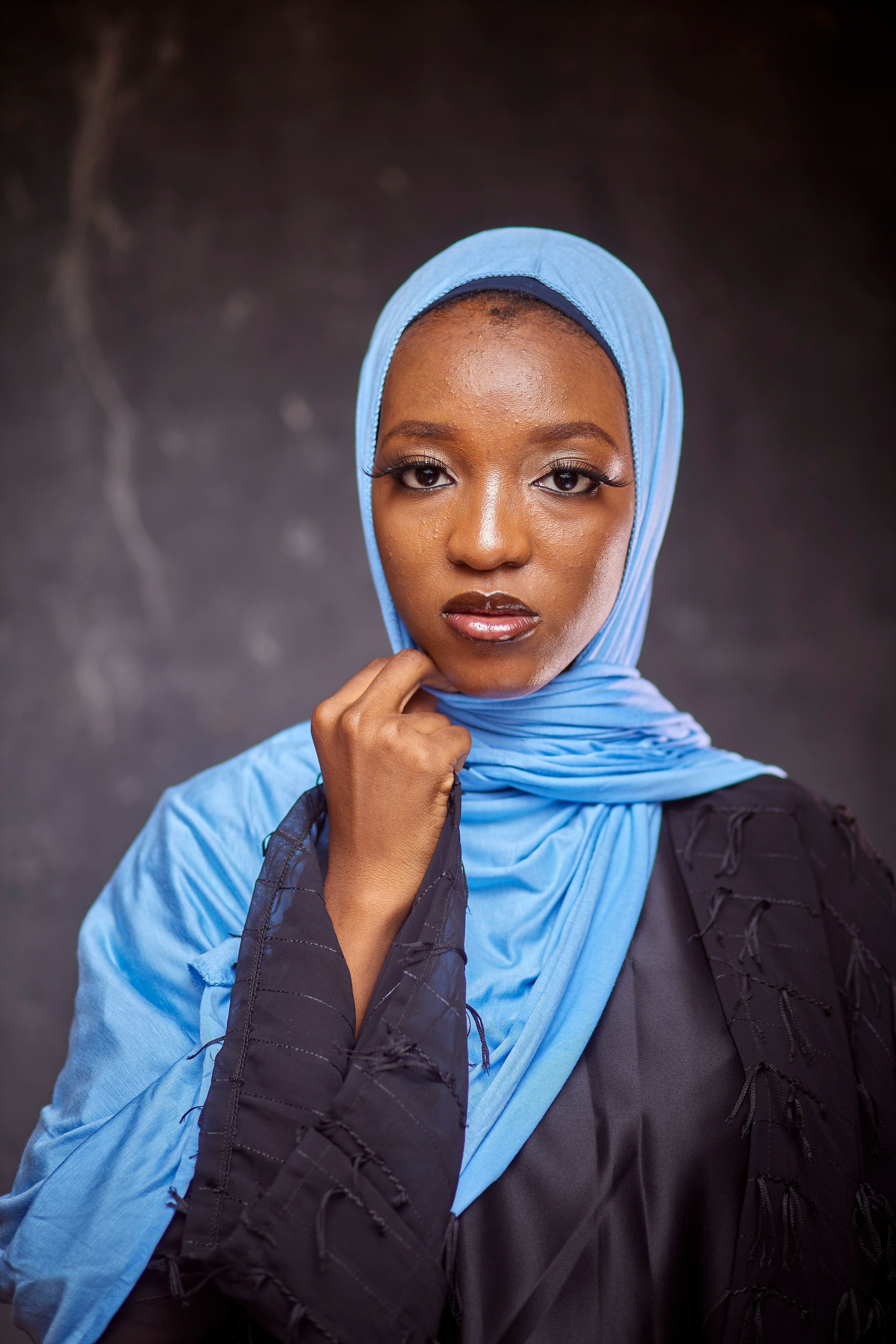 Elegant Portrait of Woman in Blue Hijab · Free Stock Photo