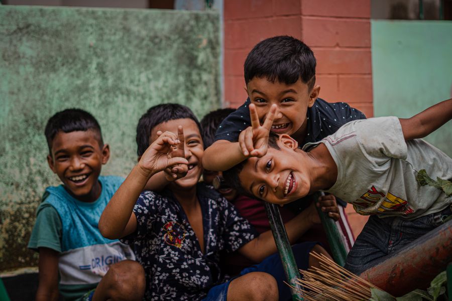 Group of happy children laughing outdoors — kids photography