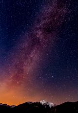 Wallpaper art — starry night over a mountain, photo by Adi K on Pexels