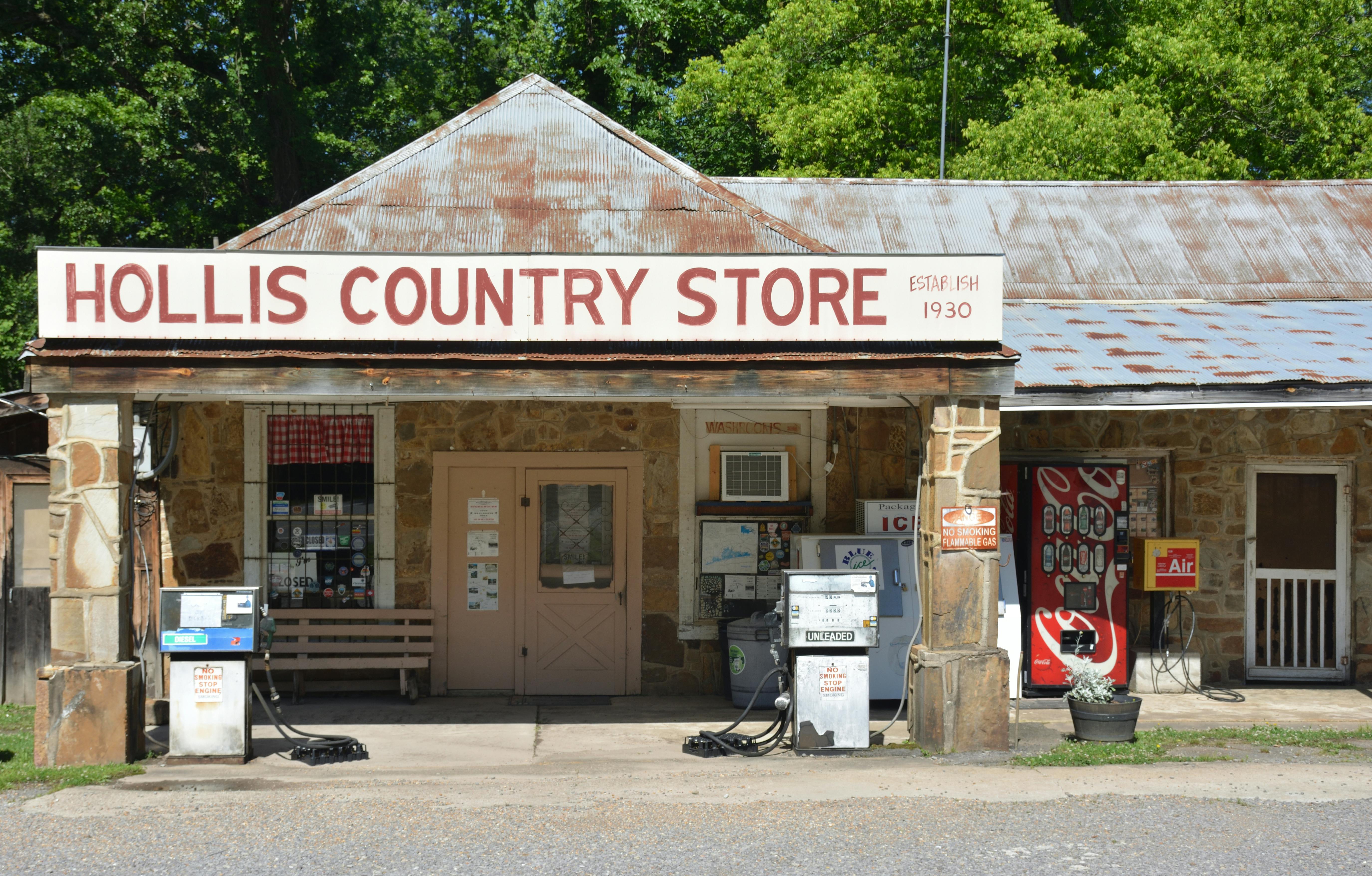 Rustic country store in Hot Springs, Arkansas with vintage gas pumps and signage.