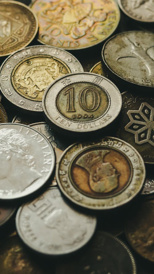 Stack of old golden and silver coins