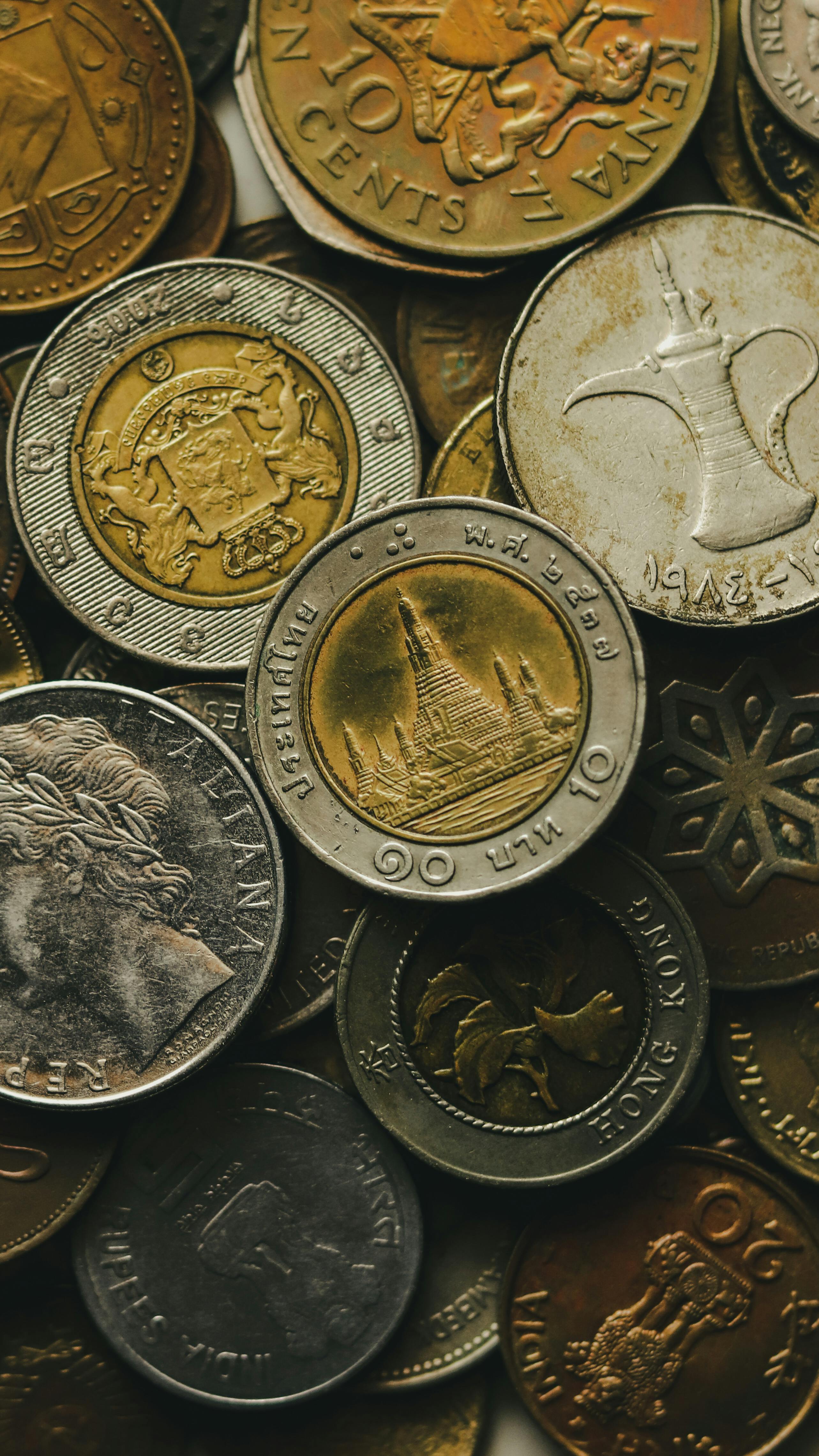 Heap of golden and silver coins · Free Stock Photo