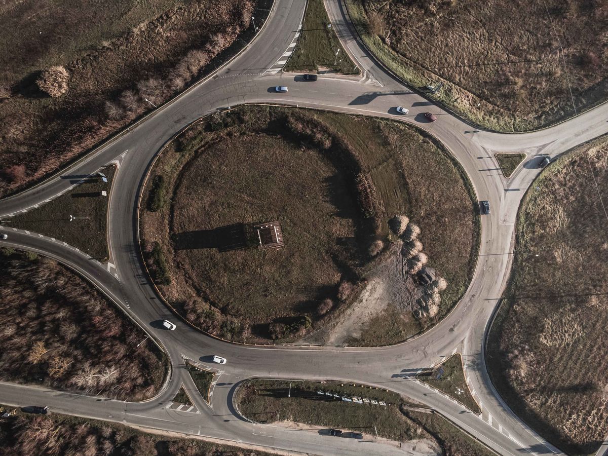Aerial view of a circular traffic roundabout, similar to Corona California's famous circular Grand Boulevard