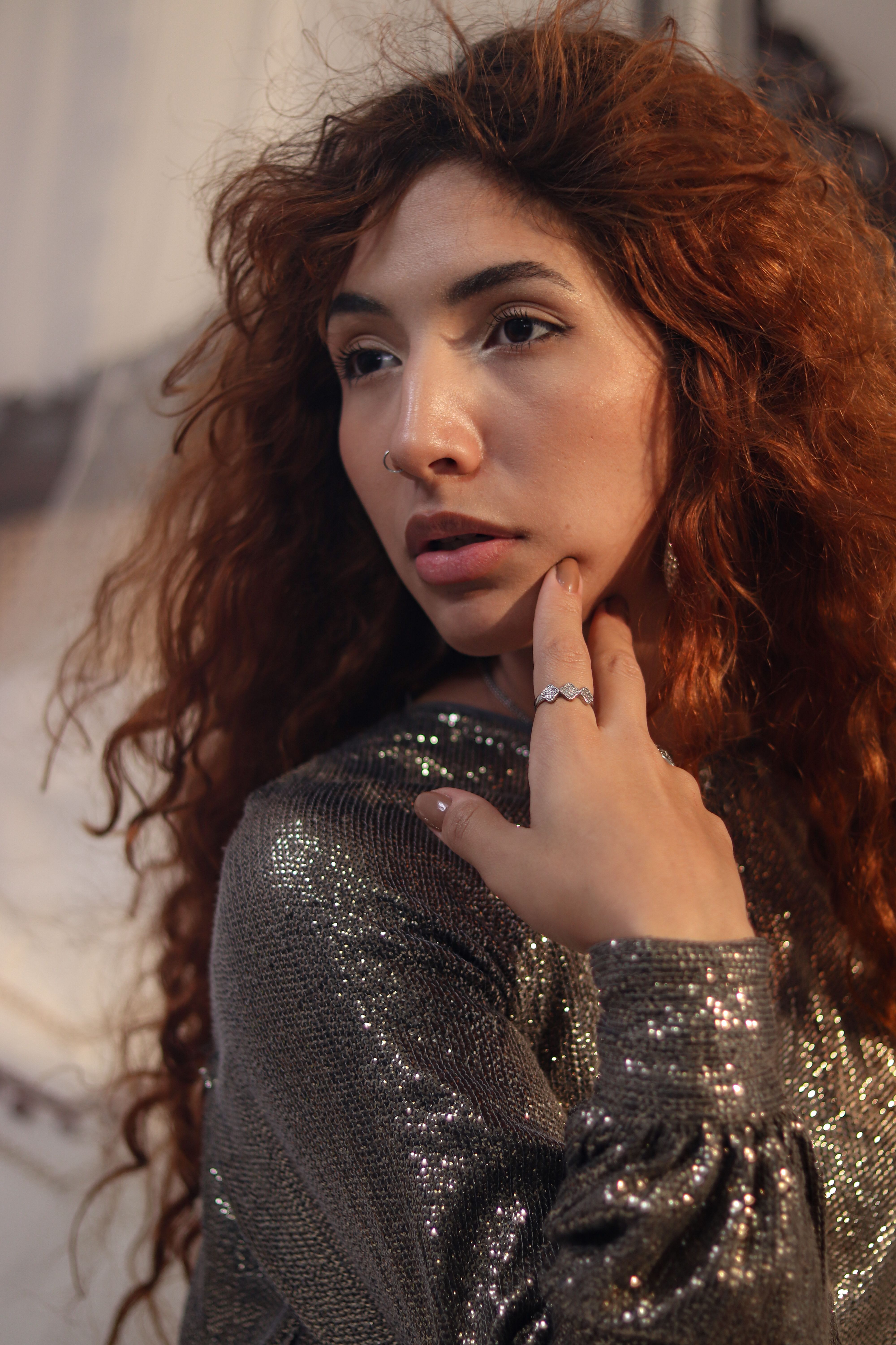 Elegant Portrait of Woman with Curly Red Hair · Free Stock Photo