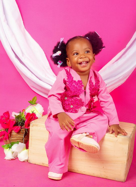 Adorable Smiling Baby in Pink Outfit · Free Stock Photo