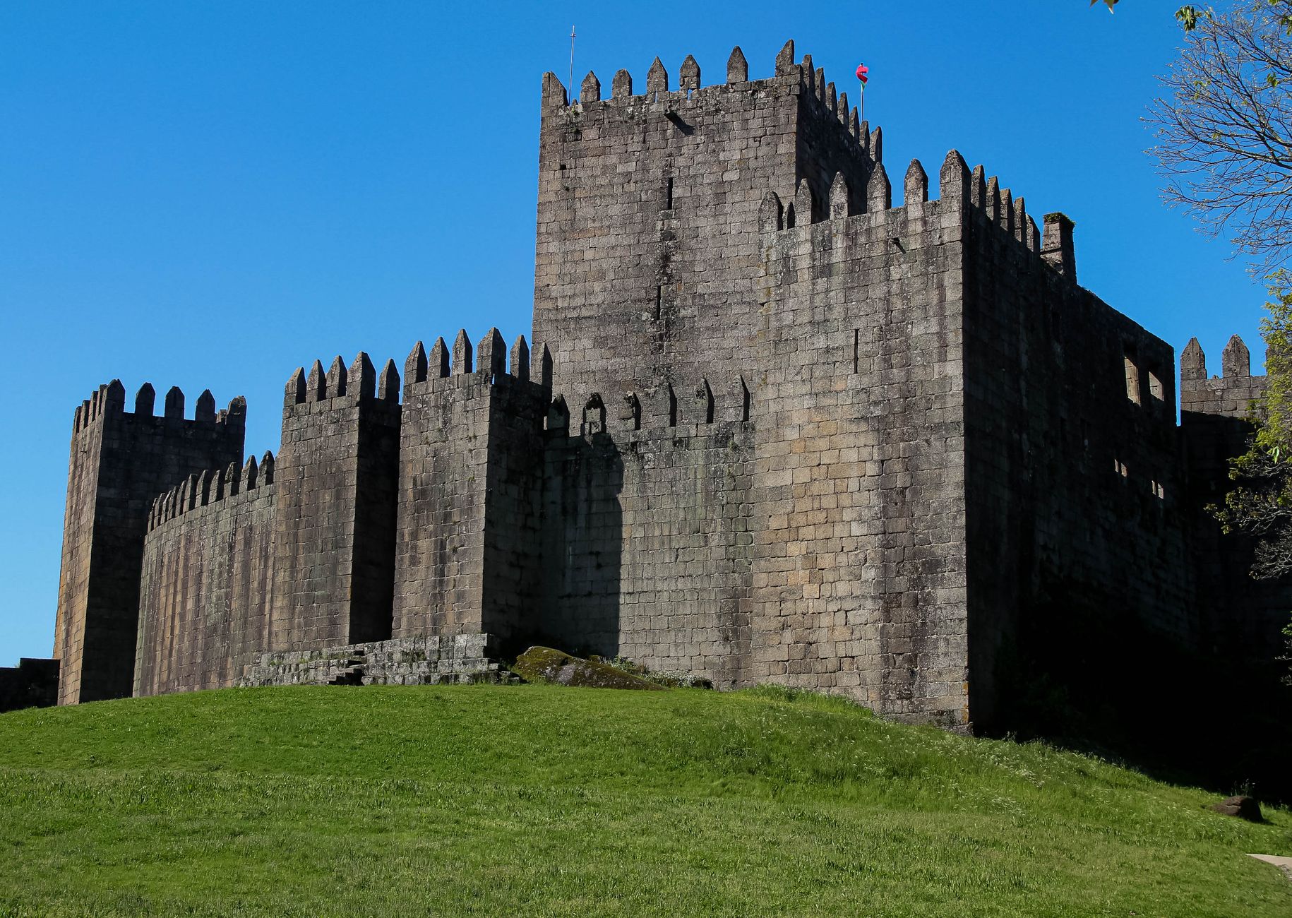 Explore the historic Guimarães Castle, a stunning example of medieval architecture in Portugal.