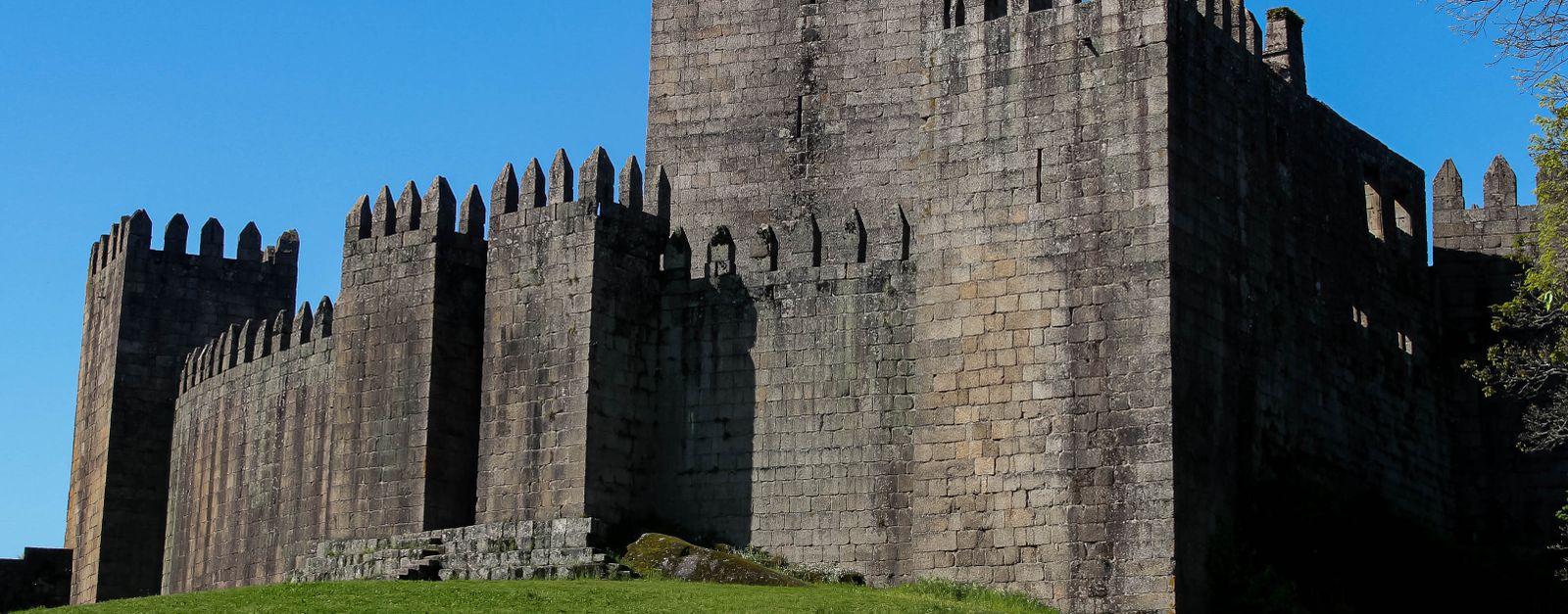 Explore the historic Guimarães Castle, a stunning example of medieval architecture in Portugal.