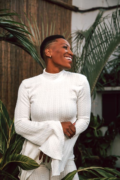 Woman Smiling in Outdoor Natural Setting · Free Stock Photo