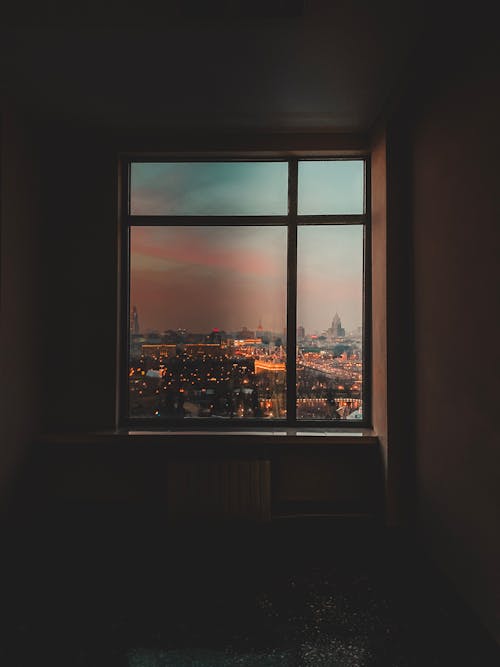 View from flat window of night cityscape