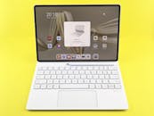 Modern Tablet with Keyboard on Yellow Background