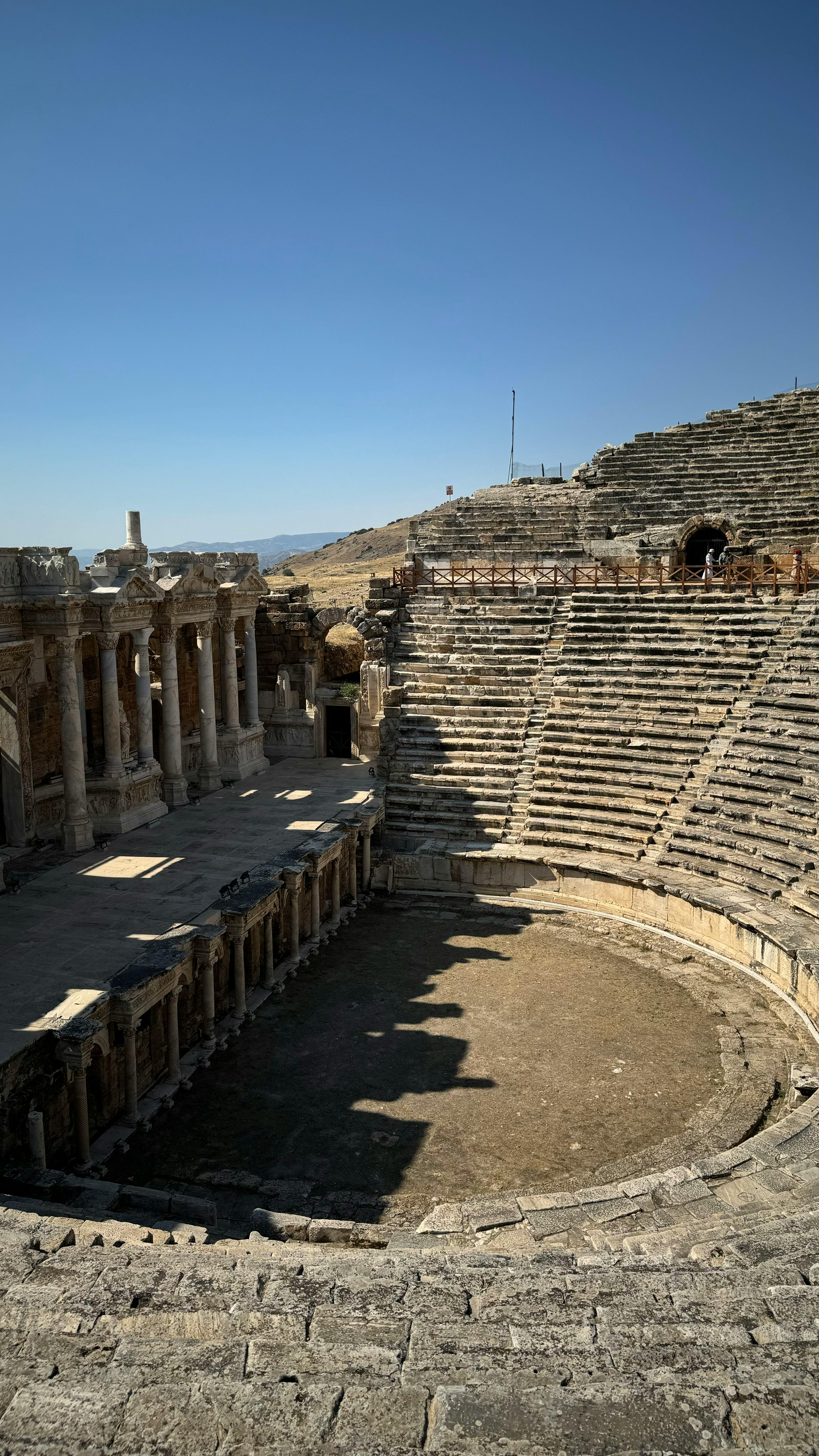 Free Explore the historic ruins of the Hierapolis Amphitheater in Turkey, a stunning 2nd-century structure. Stock Photo