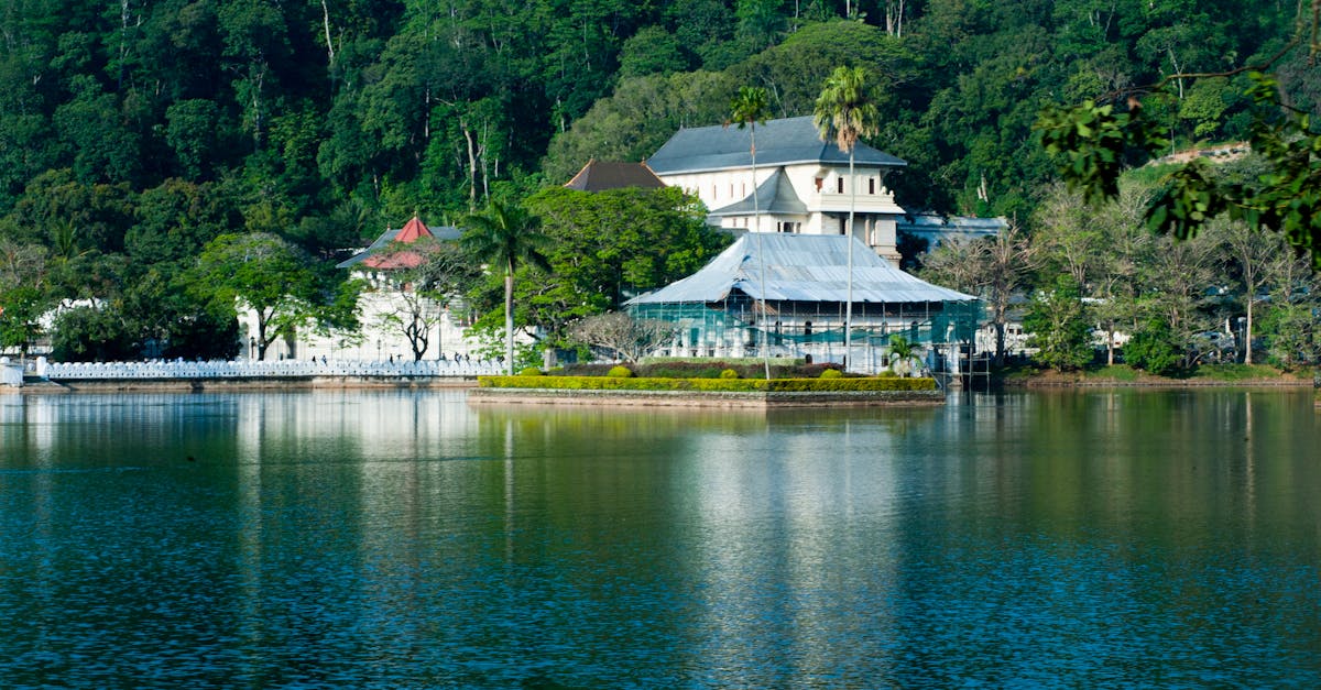 Gregory Lake Nuwara Eliya with mountain reflections and mist