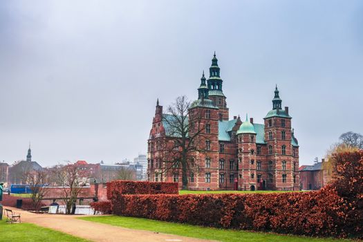 Charming view of historical Rosenborg Castle in Copenhagen under a clear sky.