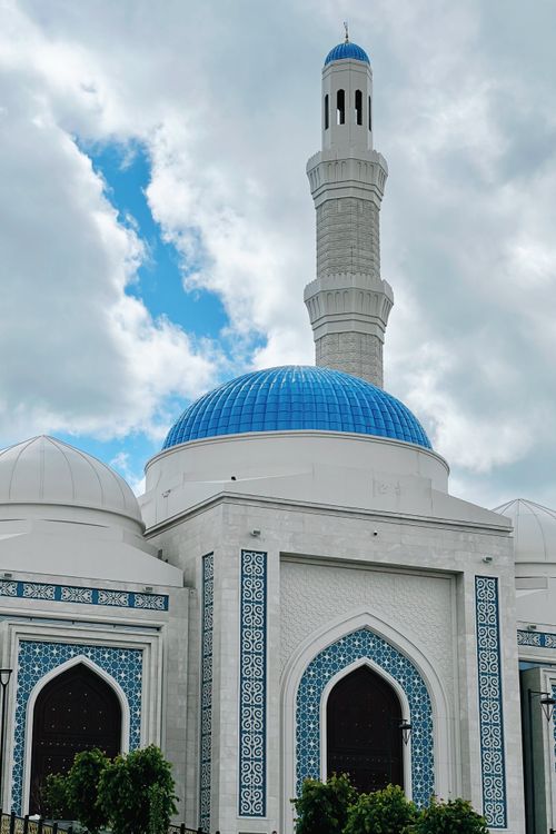 Free Stunning mosque with a blue dome and intricate designs under a cloudy sky in Astana. Stock Photo