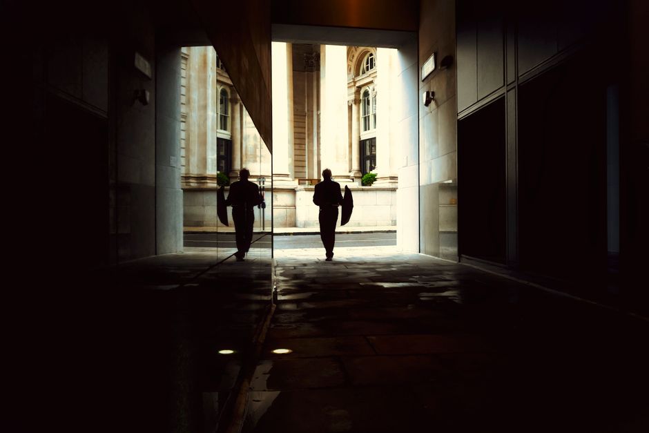lone figure London street night
