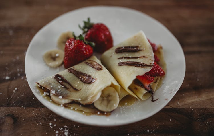 Photo Of Crepe Beside Strawberry