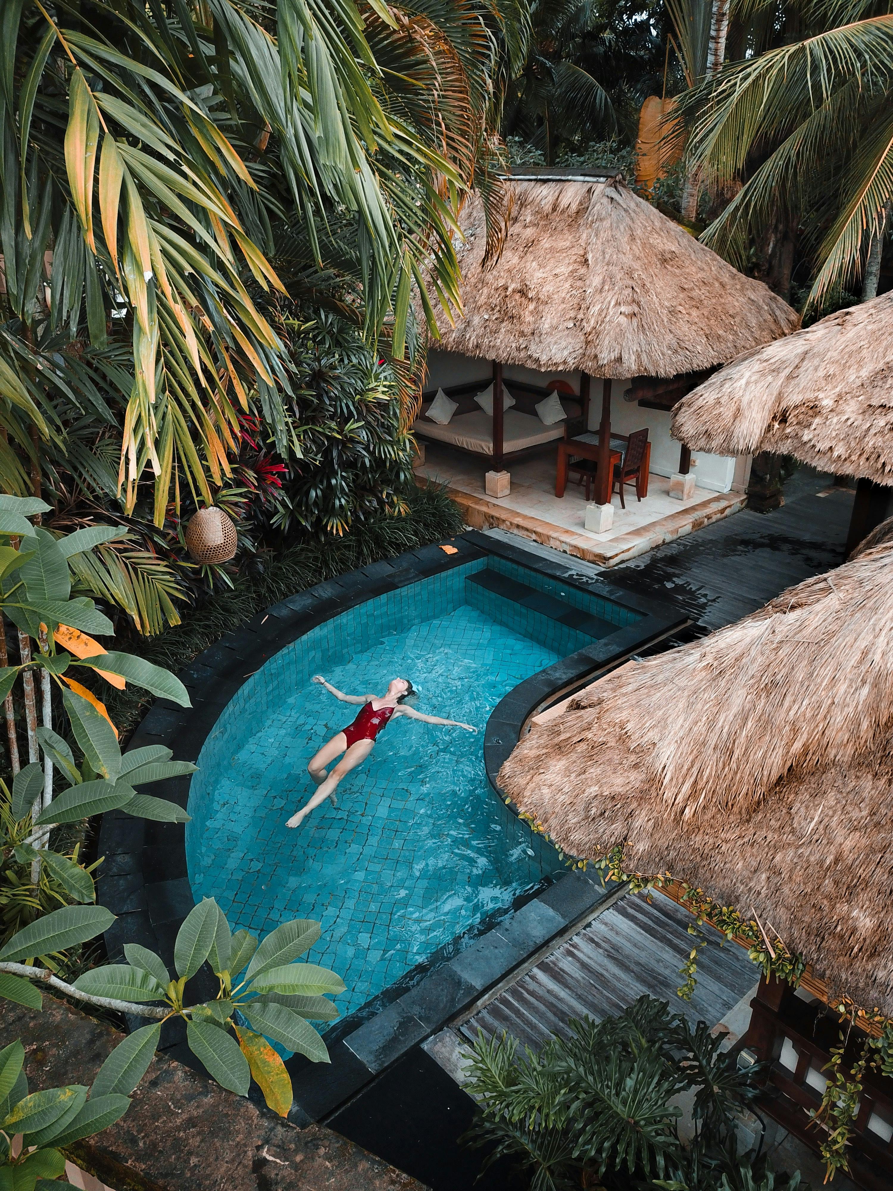 woman soaking on the swimming pool