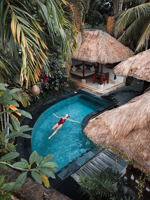 Woman Soaking on the Swimming Pool