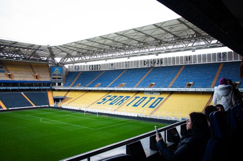 Free Spacious modern stadium with navy blue and yellow seating in Tekirdağ. Stock Photo