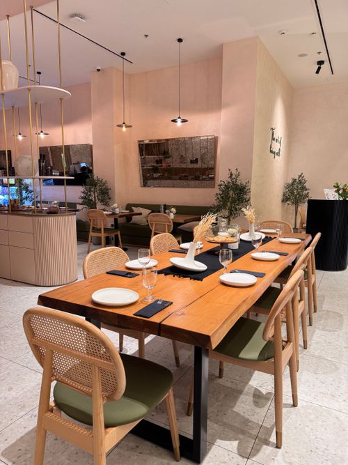 Modern Restaurant Interior with Cozy Dining Area · Free Stock Photo