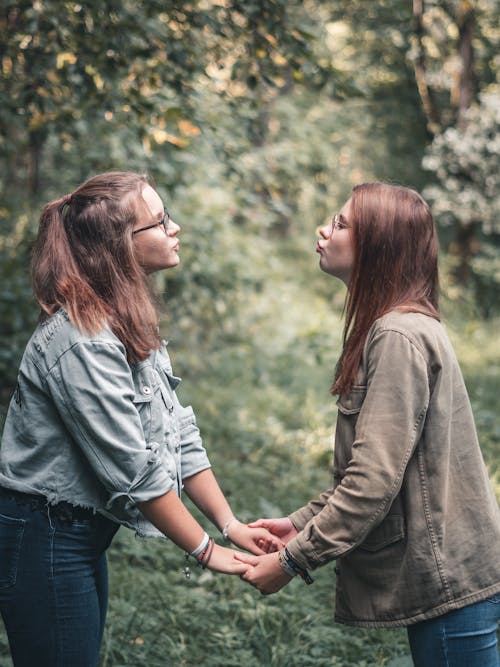 Free Photo Of Women Holding Hands Stock Photo