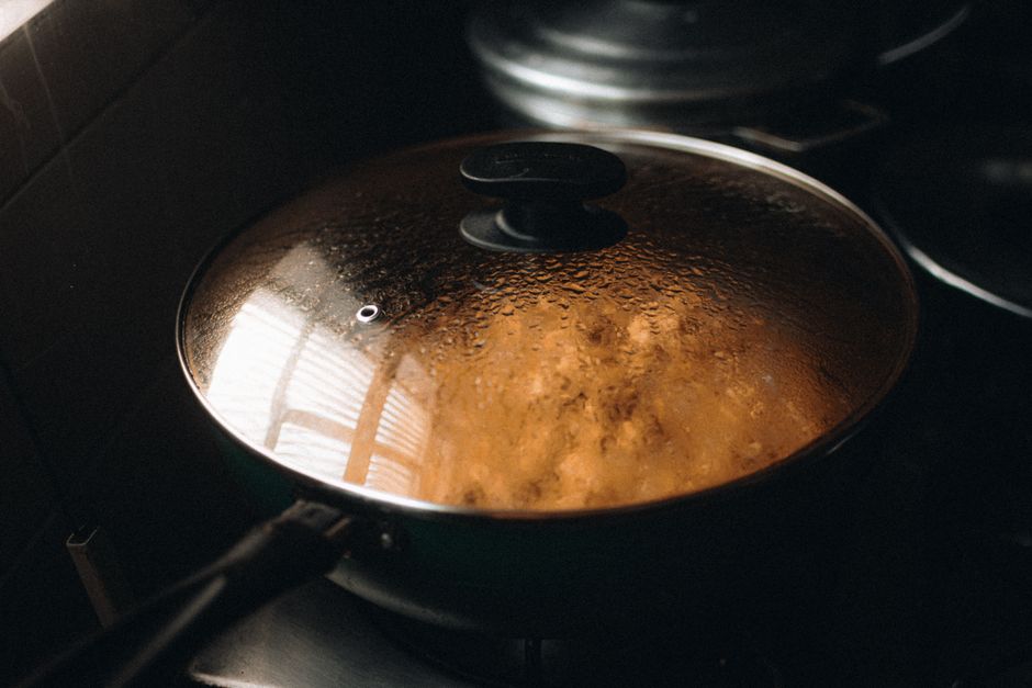 steaming fish in pot