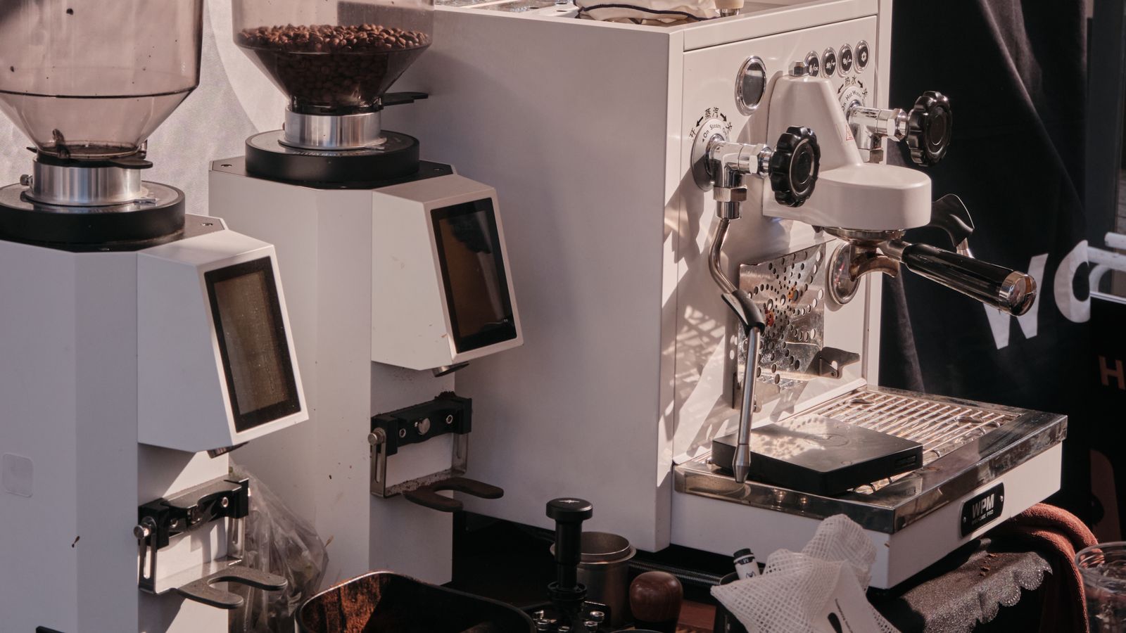 A matched Hardshell espresso machine and coffee grinder set — same design language, materials and finish from one factory for a consistent brand shelf