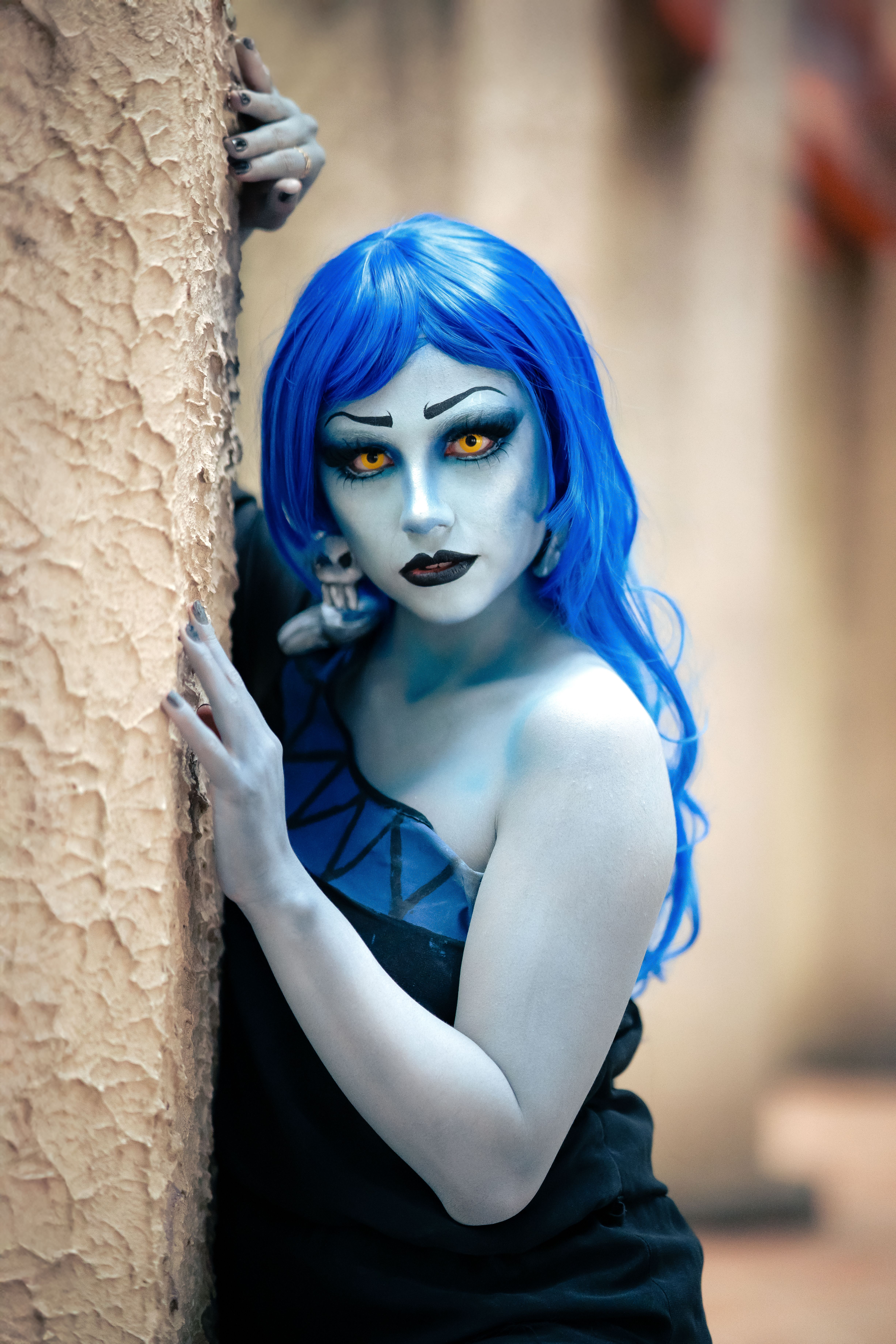 Cosplayer in Blue Wig and Fantasy Makeup