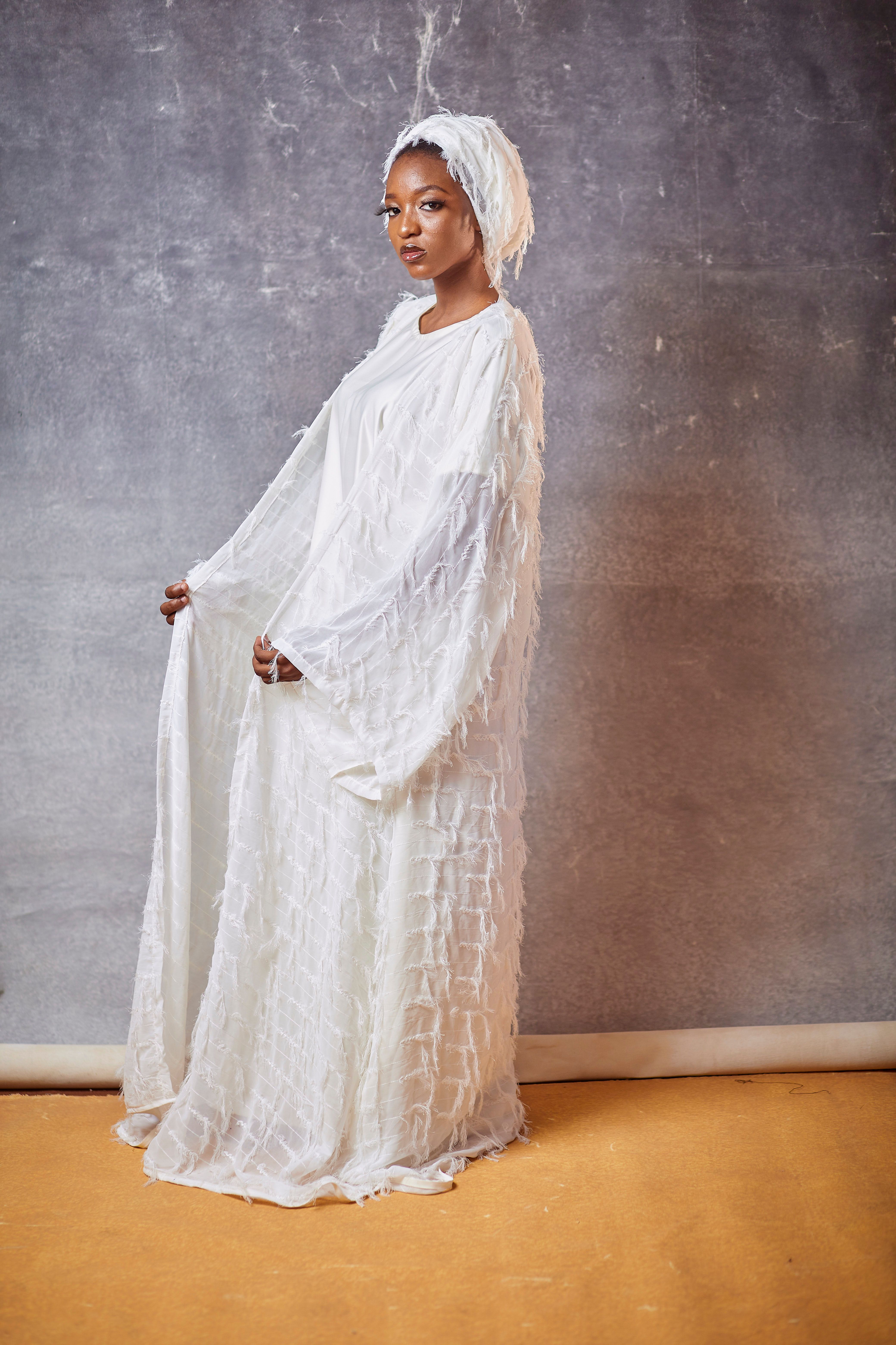 Elegant Portrait of Woman in White Textured Gown · Free Stock Photo