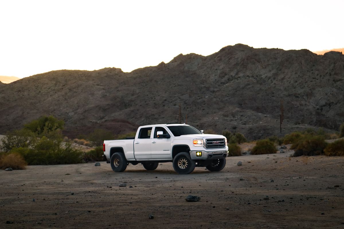 White 1 ton pickup truck available for rent in Dubai