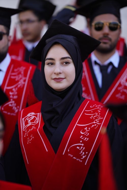 Free A group of students celebrating graduation wearing academic regalia in Mashhad, Iran. Stock Photo