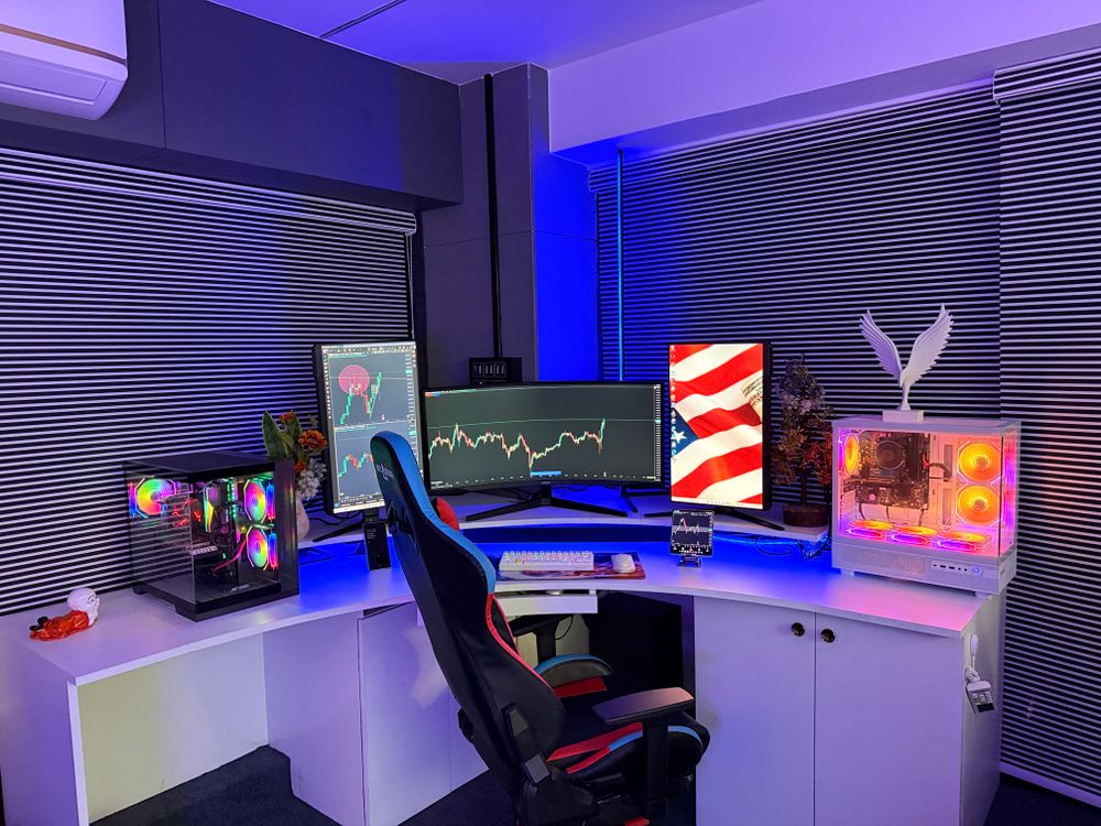 Modern Gaming and Trading Setup with RGB Lighting · Free Stock Photo