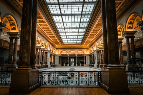 Free Stunning architectural interior featuring grand columns and intricate ceilings in a museum setting. Stock Photo