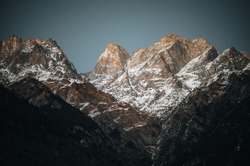 Free Beautiful snow-covered mountain peaks in the early morning light, showcasing natural grandeur and tranquility. Stock Photo