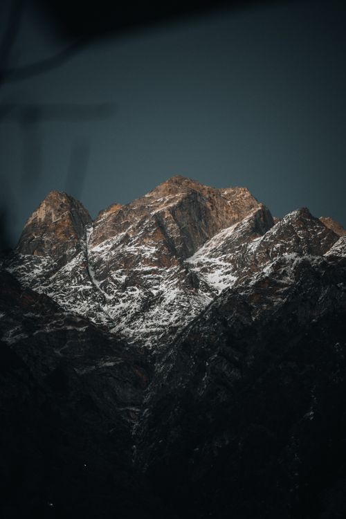 Free Captivating view of snow-capped Himalayan peaks under a twilight sky, showcasing natural beauty. Stock Photo