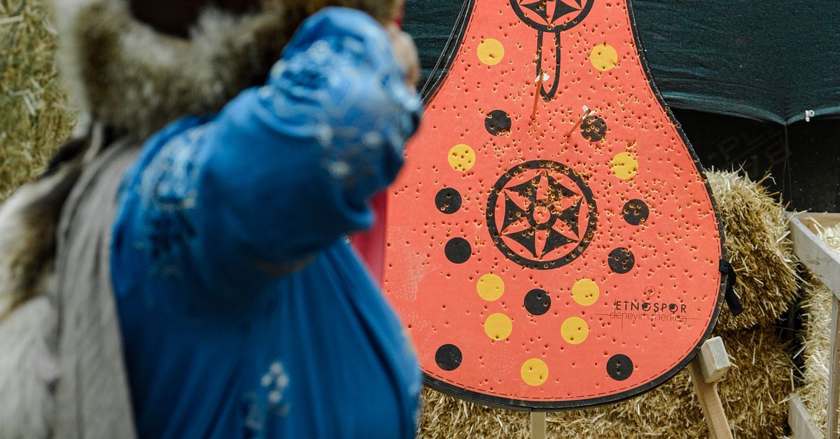 Archer Color Target Traditional Archer Aiming at Colorful Target · Free Stock Photo