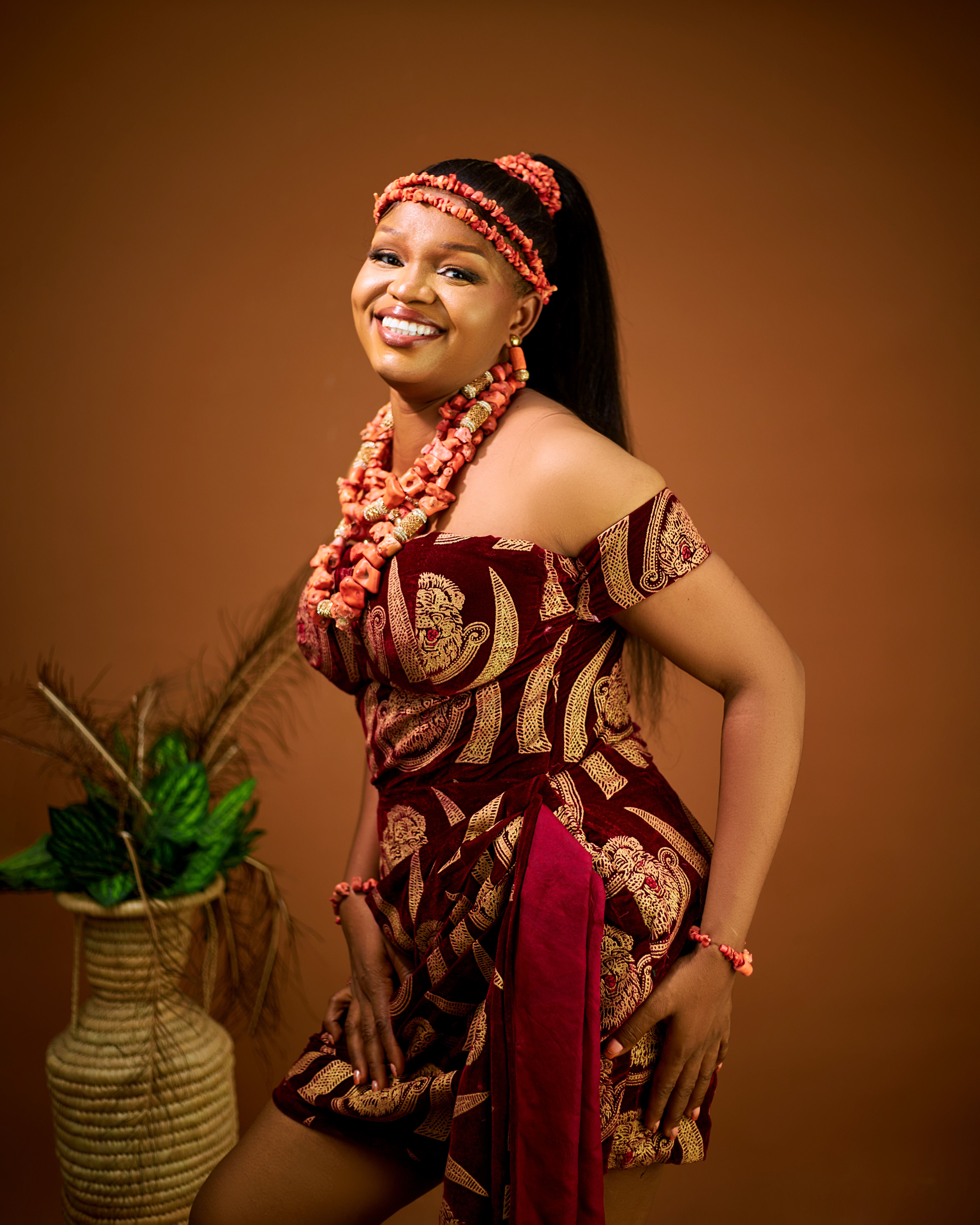 Smiling Woman in Traditional African Attire · Free Stock Photo