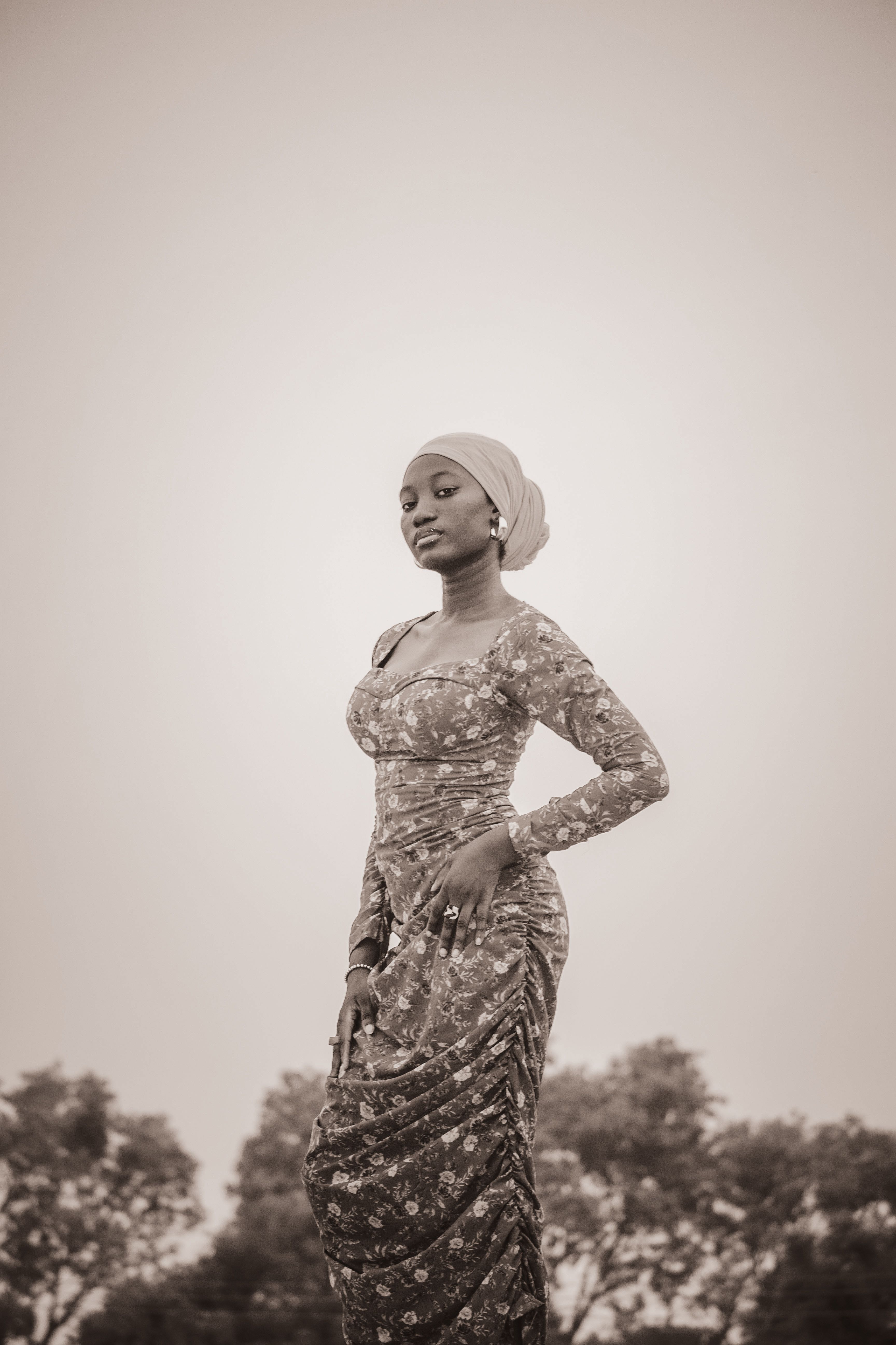 Graceful Woman Posing in Traditional Dress Outdoors · Free Stock Photo