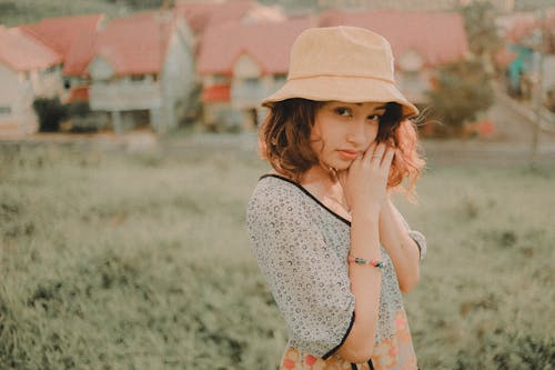 Photo Of Woman Wearing Bucket Hat