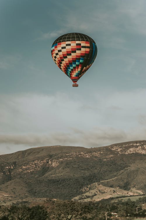Flying Multicolored Hot Air Balloon
