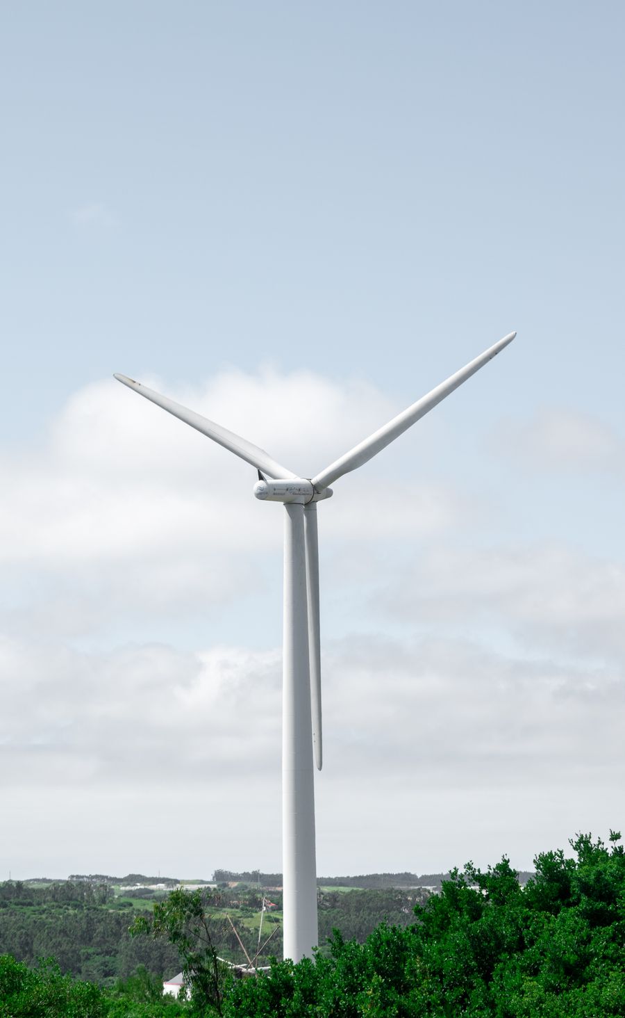 Wind turbine in green landscape