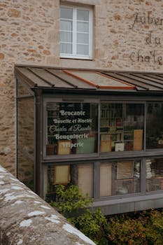 A quaint bookshop facade in Clisson, France, showcasing vintage charm and architectural elegance.