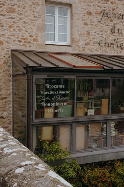 A quaint bookshop facade in Clisson, France, showcasing vintage charm and architectural elegance.