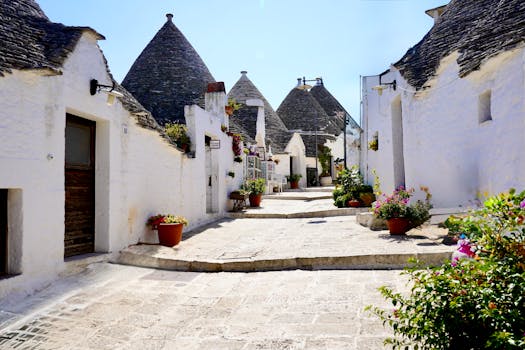 Charming view of Trulli houses in Alberobello, Italy during a sunny day.