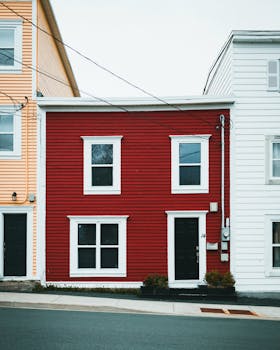 Brightly painted row houses create a vibrant urban streetscape.