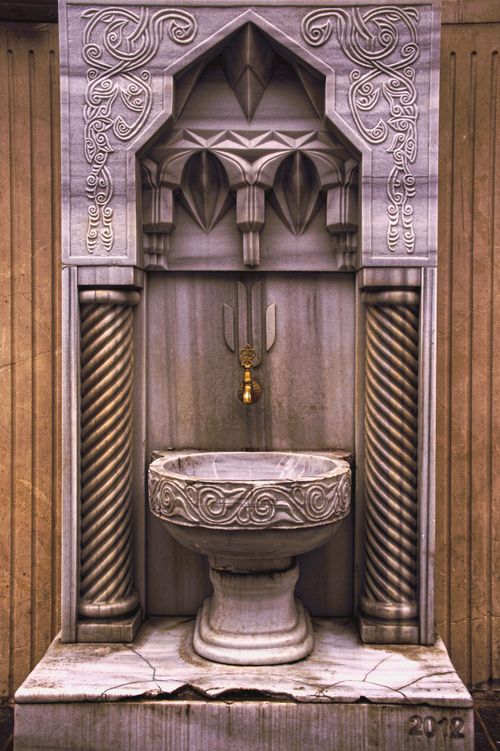 Free Detailed view of an ornate Ottoman-style fountain, showcasing intricate stone carvings in Istanbul. Stock Photo