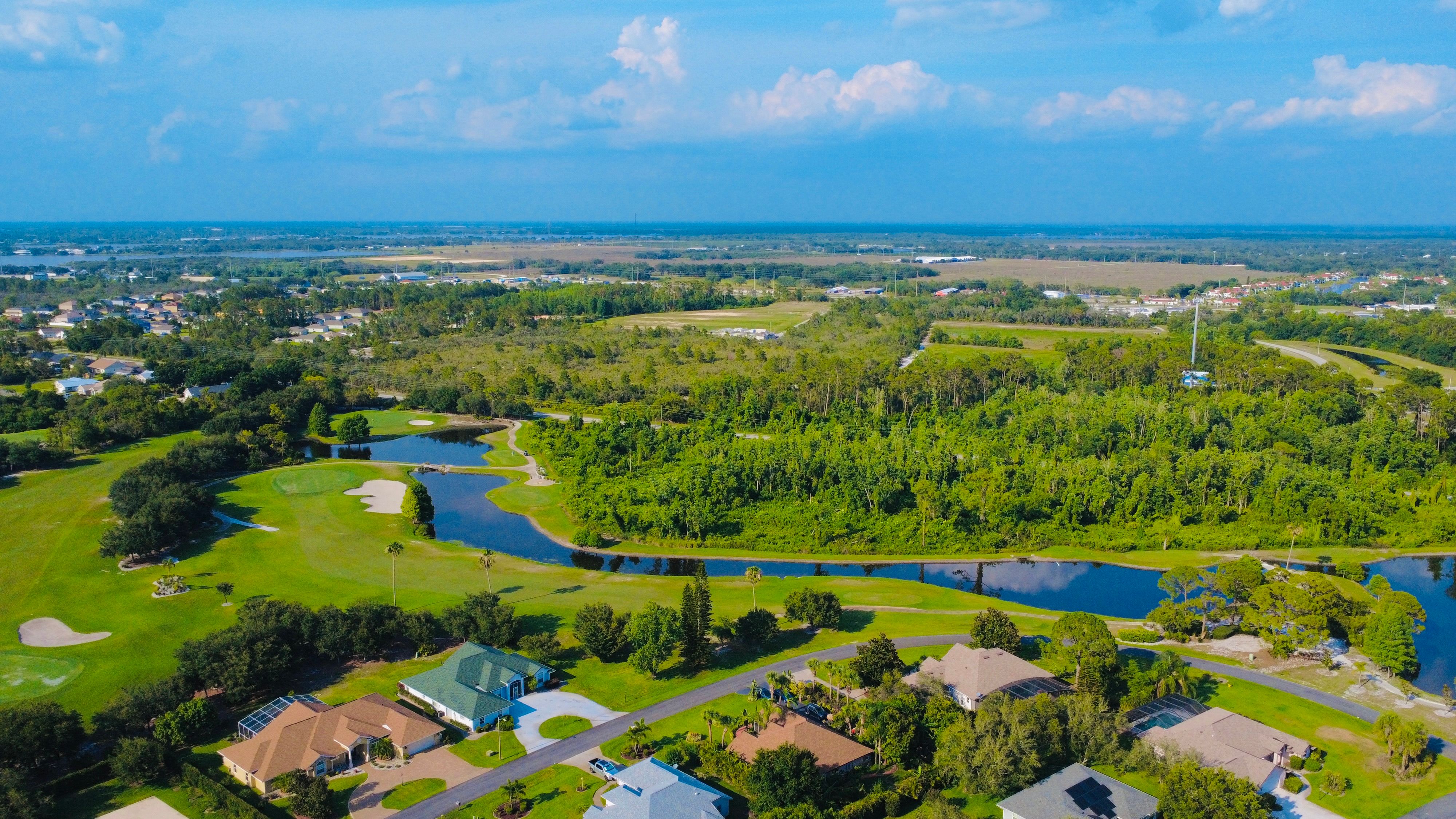 Aerial view of golf course homes in Florida, a vacation rental investment property opportunity near Destin FL and 30A