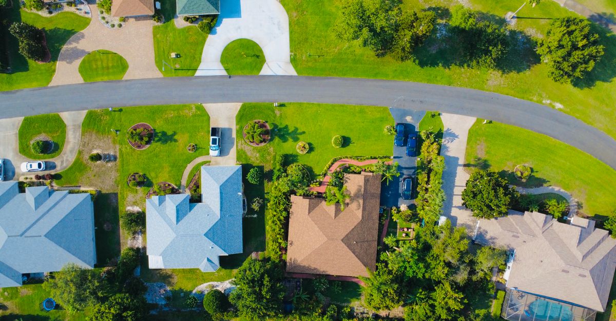 suburban neighborhood real estate aerial view 2025