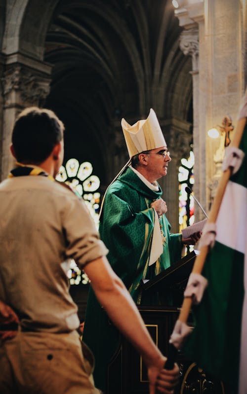 Free Photo of Priest Standing on Cathedral Stock Photo